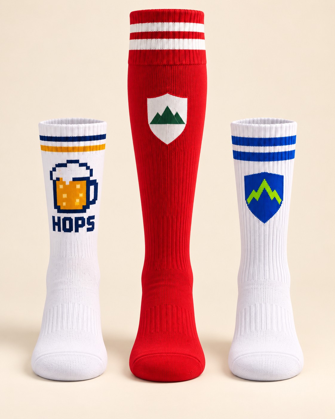 Three custom sock styles: smooth beer-themed crew, red knee-high football sock and white ribbed sports crew with a shield logo